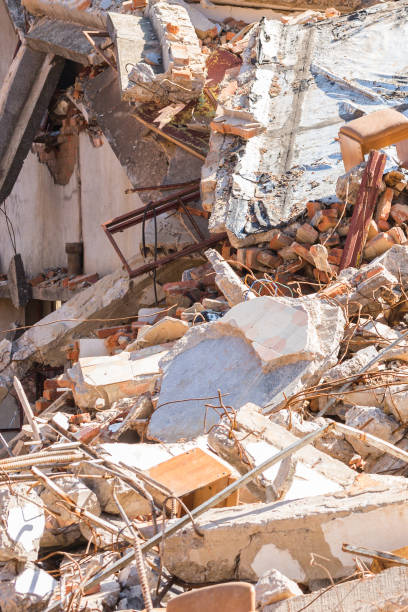 istock closeup of building demolition after earthquake 656048294