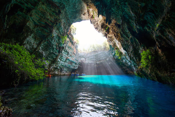 Melissani lake Famous melissani lake on Kefalonia island - Greece kefalonia stock pictures, royalty-free photos & images