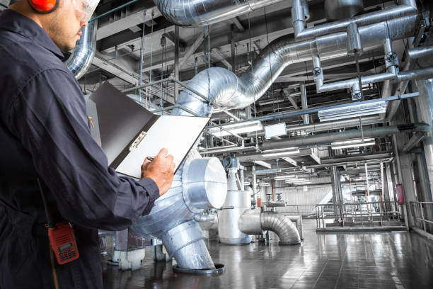 istock Engineer taking notes at thermal power plant factory 656056980