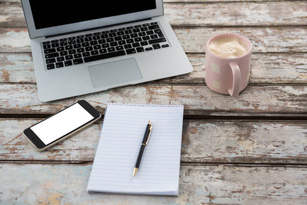 istock Laptop with smartphone and cup of coffee 656057724