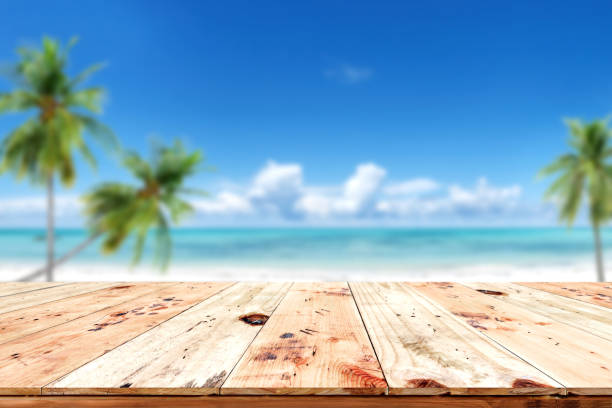 istock Top of wooden table on beach 656057938