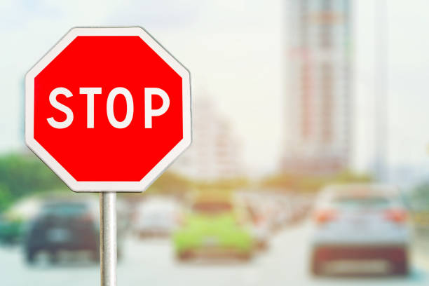 istock Stop sign by the City road 656058842