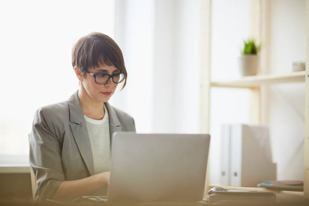 istock Contemporary Businesswoman Working with Laptop 656072992