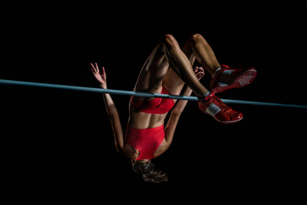 istock Female athlete performing a high jump 656078126