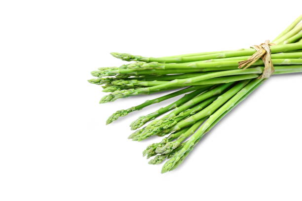 Fresh asparagus on white background and clipping paths. stock photo