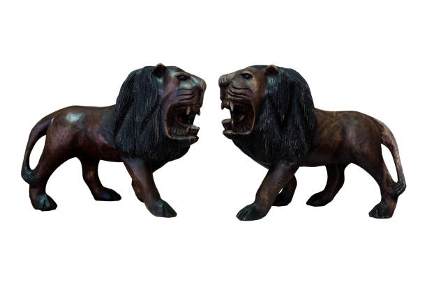 istock Handcraft wooden lion isolated on white background. 656082738