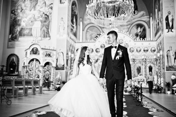 istock Wedding couple walk at church 656089516