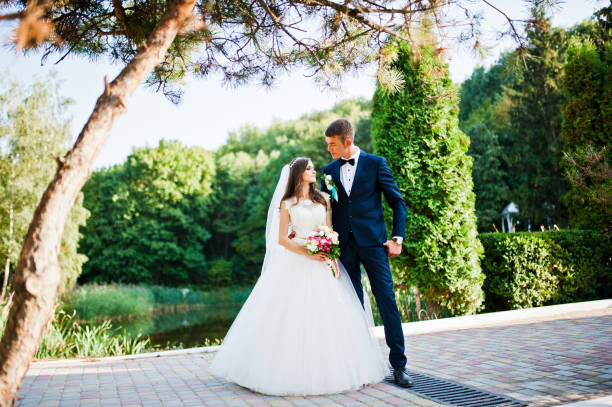 istock Wedding couple on pavement background wood 656089762