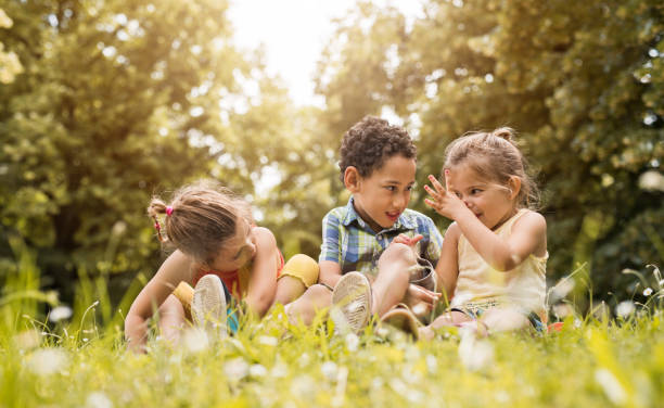 istock Small happy friends having fun together in the park. 656090332