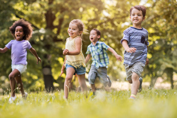 istock Playful children running in nature and having fun. 656092418