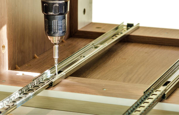 istock Assembling of furniture closeup 656092422