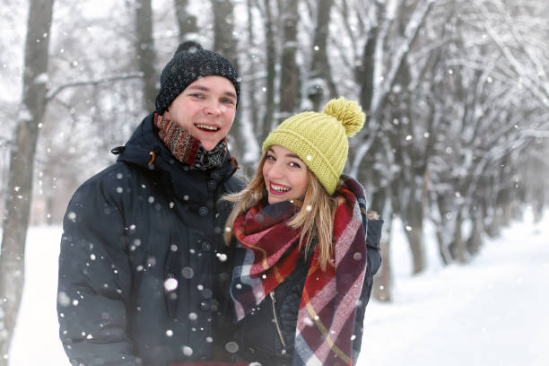 istock family couple walk winter snow 656093230