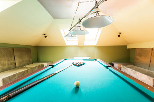 istock Entertainment attic room with a billiard table 656100704