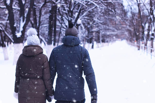 istock young couple walking along the road 656104788