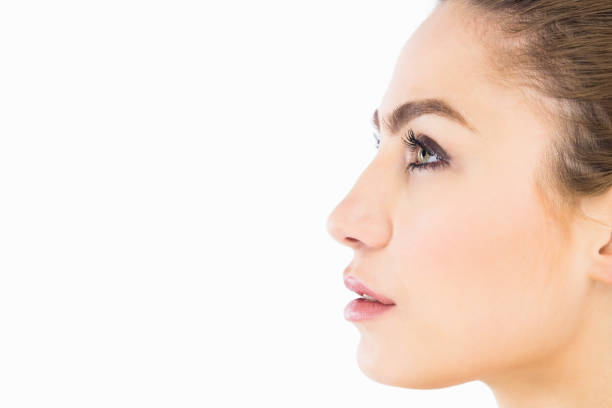 istock Side view of beautiful woman posing against white background 656104806