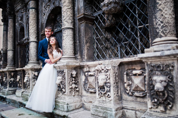 istock Wedding couple near old architecture 656105462