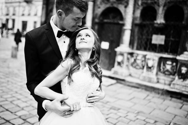 istock Wedding couple near old architecture 656105552