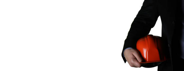 istock man in suit with helmet closeup 656111574