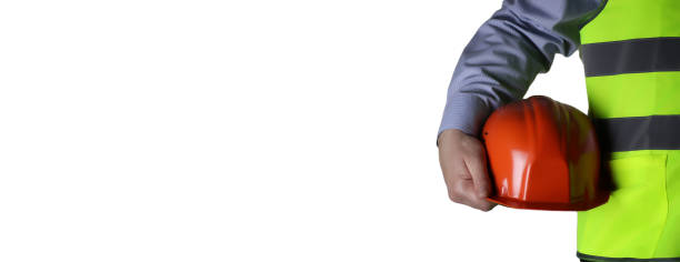 istock man in suit with helmet closeup 656111780