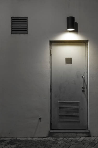 istock Light, air vent and door on wall 656112570