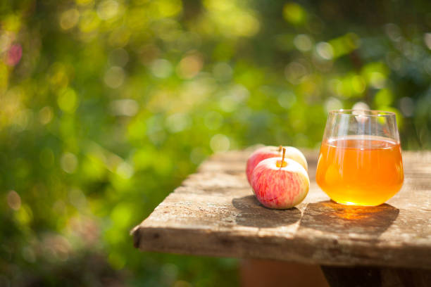 istock Delicious fresh squeezed apple juice in  transparent glass 656115906