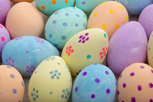 Close up shot of hand-painted pastel eater eggs for backgrounds