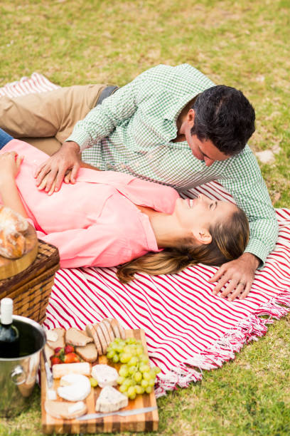 istock Happy couple relaxing on a blanket 656121832