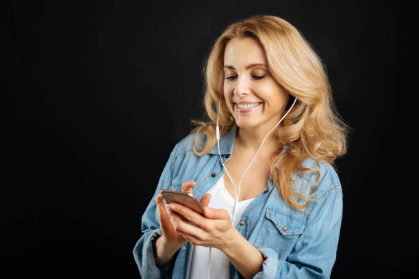 istock Very glad girl while listening songs 656124036