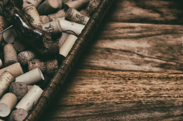 istock wine corks in a old basket bread on rosewood timber 656124218
