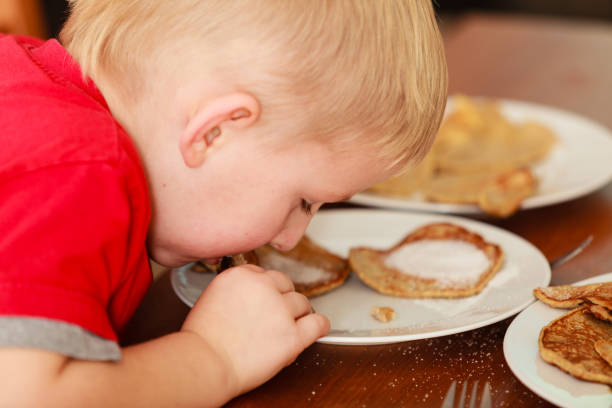 istock Little boy eating pancakes for breaktfast 656126314