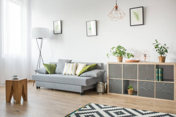istock Living room with grey couch 656128600