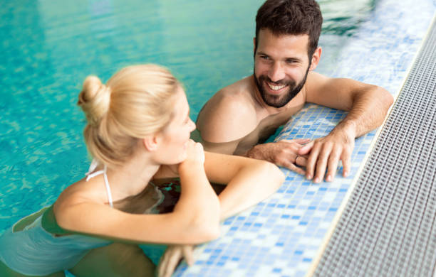 istock Happy married couple relaxing at wellness spa resort 656129930