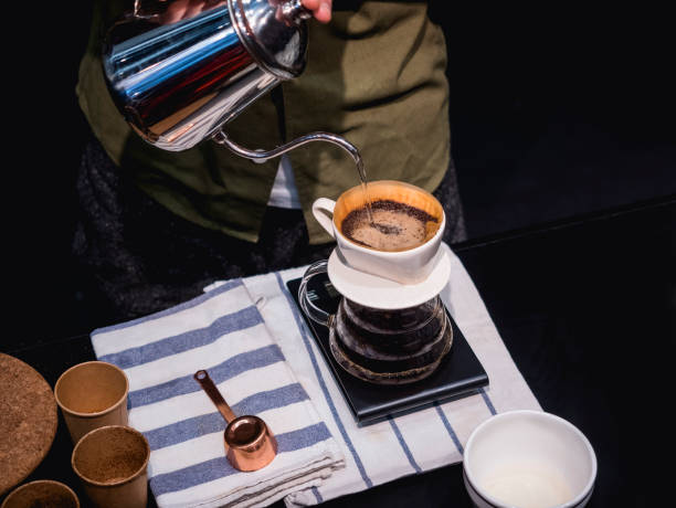 istock Hand Drip Coffee Barista pouring water on coffee ground 656130028