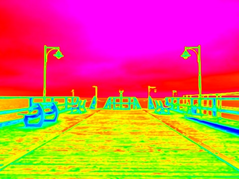 Amazing thermography photo. Empty wooden mole in sea wharf. Sea wharf for hired boats in marina. Empty sea bridge