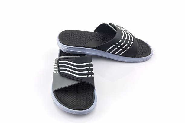istock Sandals shoes. Black color flip flops. 656137124