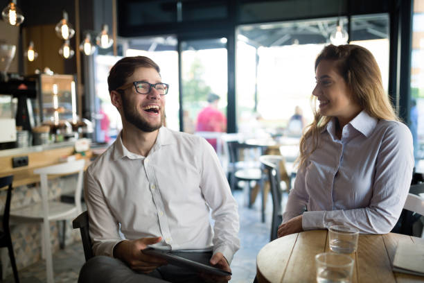 istock Happy business colleagues dating in restaurant 656142500