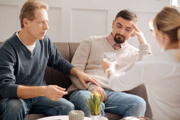 istock Serious thoughtful man calming down his boyfriend 656144912