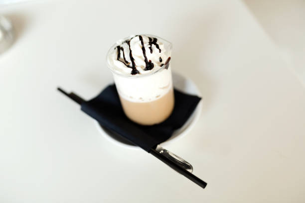 istock Long coffee with creme and hot chocolate on table 656145130