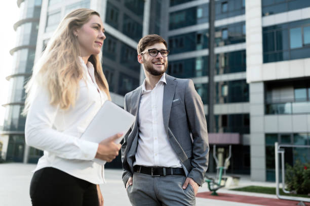 istock Business people commuting on street and talking 656146246