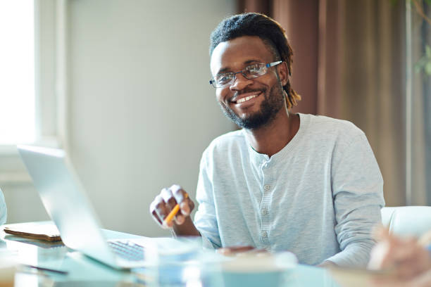istock Afro-American businessman sitting in office 656152114
