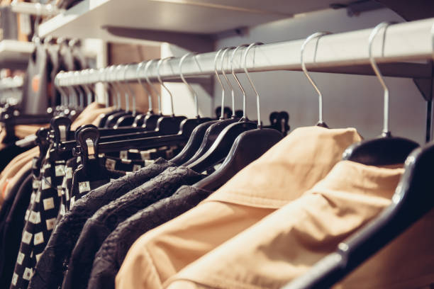 istock different clothing on hangers in shop 656152142