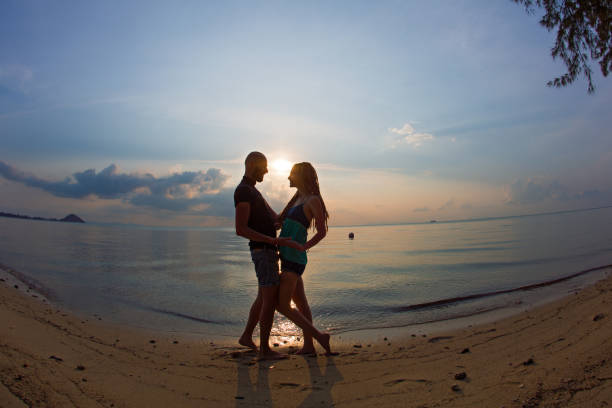 istock Young couple on sea sunset 656164828