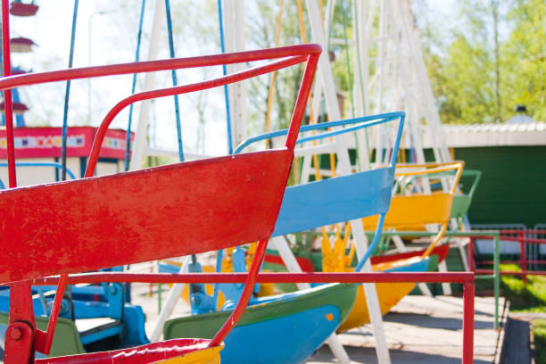 istock Empty Playground and swings in colorful park, Russia. 656164844