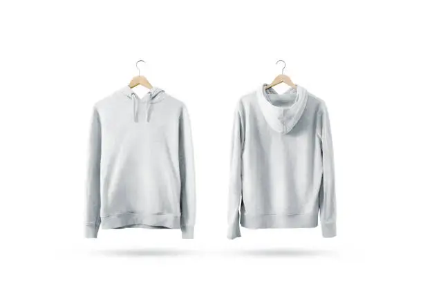 Blank white sweatshirt mockup set hanging on wooden hanger, front and back side view. Empty sweat shirt mock up on rack. Clear cotton hoody template. Plain textile hoodie. Loose overall jumper.