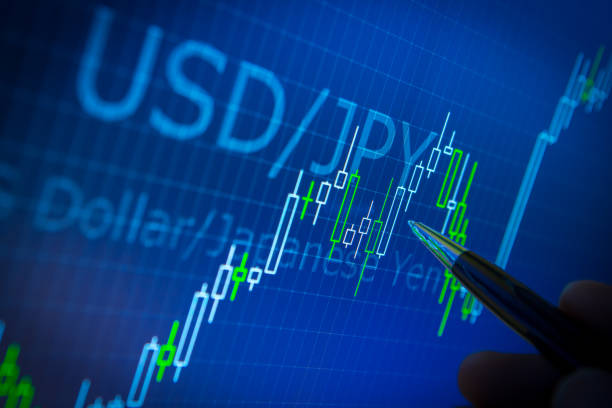 istock Data analyzing in forex market: the charts and quotes on display. Analytics in pairs USD / JPY 656173416