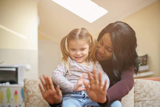 istock African American woman with child. 656179994