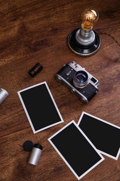 istock Vintage photo camera. Blank photo frames. 656183656