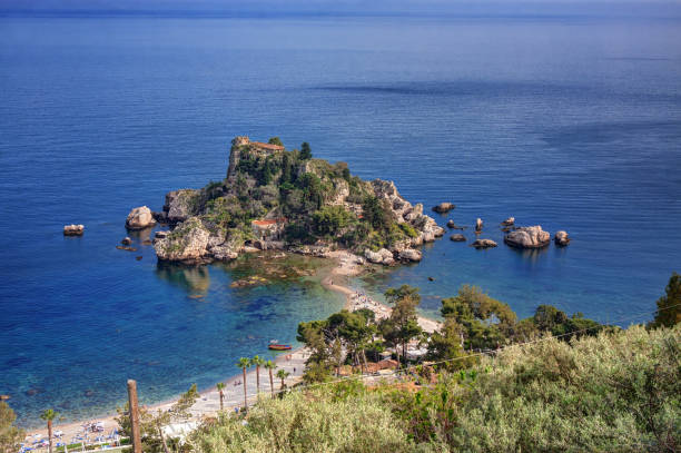 Isola Bella, Taormina. Taormina, Sicily (Italy): Isola Bella seen from above during a summer sunny day. isola bella taormina stock pictures, royalty-free photos & images