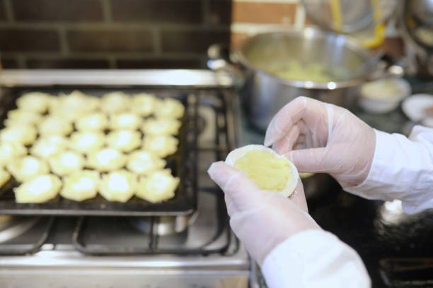istock Male chef uses ingredients for preparing flour products on kitch 656189298