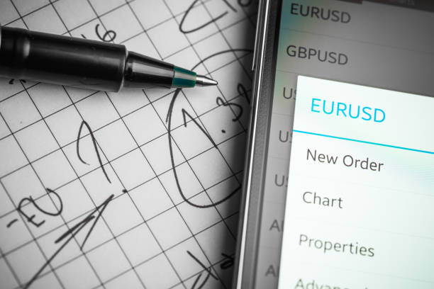 istock Data analyzing in forex market: the charts and quotes on smartphone display. Analytics  pair U.S. dollar 